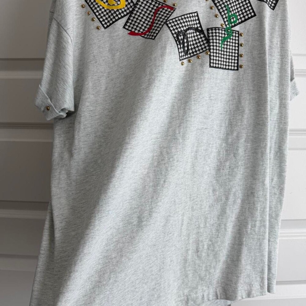 Vintage Gray vintage 90s tee with black-and-white checkered squares and colorful
